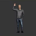 A Man Waving Hand In Gray Hoodie And Blue Jeans Against Gray Background