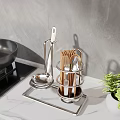 Stainless Steel Kitchen Utensil Organizer Rack With Chopsticks Spoons And Pan On Countertop
