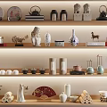 Stylish Decorative Ornament Combination with Plates Teapots Vases and Small Sculptures on Shelves