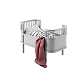Gray Baby Crib With Black And White Striped Mattress And Red Blanket
