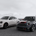 Two Stylish Cars White Volkswagen Beetle And Dark MINI Cooper Parked On Open Road Outdoor