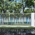 Modern Building Exterior Wall Design With White Columns Metal Railings Green Trees And Lush Grass