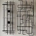 Industrial Black Pipes Artistic Arrangement With Curved And Straight Lines On Light Wall
