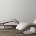 Modern Lounge Chairs With Sleek Design White Leather And Round Base On Wooden Floor