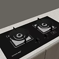 Black Glass Gas Stove Cooktop With Two Burners On Light Countertop And Wooden Cabinets