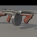 Vintage Submachine Gun With Wooden Stock Metal Body And Drum Magazine
