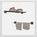 Black Wall Mounted Bathroom Shelf with Rolled Folded and Hanging Striped Towels