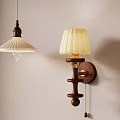Vintage Wooden Wall Sconce And Pendant With Cream Pleated Shades On Light Wall