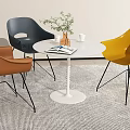 Modern White Round Table with Colorful Chairs and Decorative Items on Patterned Rug 3d model