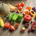 Fresh Assorted Fruits and Vegetables with Melon Cucumbers Tomatoes and Nuts on Rustic Wooden Table