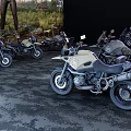 Old Three Wheeled Motorcycle With Rusty Parts And Sidecar Attachment