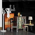 Modern Entryway Console Cabinet And Side Cabinet With Decorative Vase Lamp And Artwork