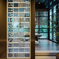 Modern Glass Room Divider With Geometric Patterns And Wooden Frame In Bright Interior Space