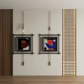 Framed Abstract Paintings Hanging on Light Wall with Red Blue Brown Colors Wooden Grid Decor
