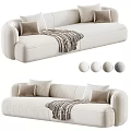 Modern Three Seater Sofa With Cream Upholstery Cushions And Striped Blanket