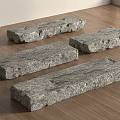 Natural Gray Stone Stepping Stones With Textured Surface Displayed On Wooden Floor For Path Decoration
