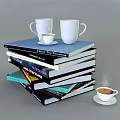 Stack of Books and Magazines with White Mugs on Top and Coffee Cup with Steam