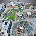 Detailed Aerial Planning of Urban Area with Buildings Green Spaces Roads and Water Features