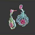 Elegant Silver Earrings With Red Gemstones And Decorative Metal Design