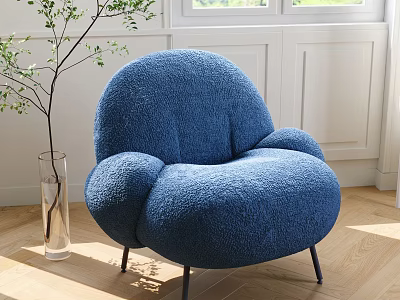 Blue Plush Rounded Lounge Chair With Black Metal Legs In Bright Room With Green Plant 3d model