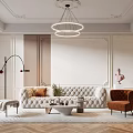 Elegant Modern Living Room Interior With Plush White Sofa Orange Armchair And Circular Pendant Light