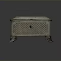 Intricately Carved Decorative Chest With Ornate Patterns Lid And Sculpted Feet Design