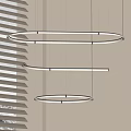 Modern Circular And Linear Pendant Lights With White Light Hanging In Interior With Blinds Background