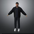 Man in Black Jacket Dark Pants White Shoes with Arms Outstretched on Gray Background