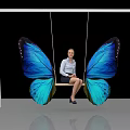 Colorful Butterfly Wing Design Swing Playground Equipment With Vibrant Blue Green Wings