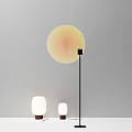Modern Floor Lamp with Round Yellow Shade and Small White Lamps in Minimalist Interior