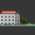 Traditional Multi Story Building With Red Roof And Palm Trees Around Circular Lawn Area