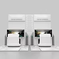 Modern Commercial Equipment Exhibition Booth With Two Interactive Units Featuring Screens And Steering Wheels