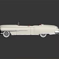 Vintage White Convertible Car With Red Interior Seats Chrome Grille And Round Headlights