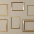 Golden Picture Frames With Various Styles Hanging On Beige Wall