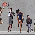 Group of People Standing and Sitting by Concrete Wall With Cheerleader Pom Poms Briefcase Folders