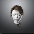 White Mannequin Head Model With Natural Brown Hair And Detailed Facial Structure