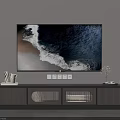 Modern TV Stand Featuring Flat Screen TV Displaying Ocean Wave Beach Scene And Storage Cabinets