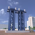 Large Blue Industrial Equipment Structure With White Cylindrical Components In Urban Area