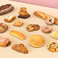 Assorted Baked Goods Collection Featuring Bread Donuts Cookies Croissants Baguette and Hamburger Bun