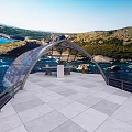 Scenic Glass Arch Viewing Platform With Tiled Floor Overlooking Coastal Water And Hills
