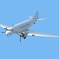 White Classic Passenger Aircraft Flying in Clear Blue Sky with Propeller Engines and Extended Wings