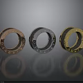 Three Colored Metallic Rings With Decorative Letters As Household Accessories