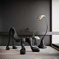 Leisure Chair with Unique Sculptural Design Curved Legs Dark Wall and Bicycle Decor Floor Lamp
