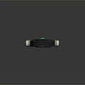 Advanced Industrial Equipment With Circular Green Glowing Display And Mechanical Control Panel