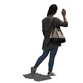 A Woman Waving Carrying Backpack Wearing White T-shirt Dark Coat Jeans And Sneakers