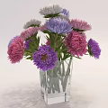 Colorful Pink Purple White Flowers In Square Transparent Glass Vase With Green Stems