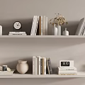 Stylish Decorative Ornament Combination With Books Clocks Vases And Dried Flowers On Shelves
