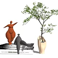 Decorative Figurine Set with Orange Standing Gray Reclining Sculptures on Books and White Vase Greenery