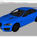 Blue Jaguar Sport Sedan With Sleek Exterior Design Black Alloy Wheels And Hood Vents