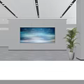 Modern Front Desk Reception Area With Large Digital Calendar Screen And Bright White Wall